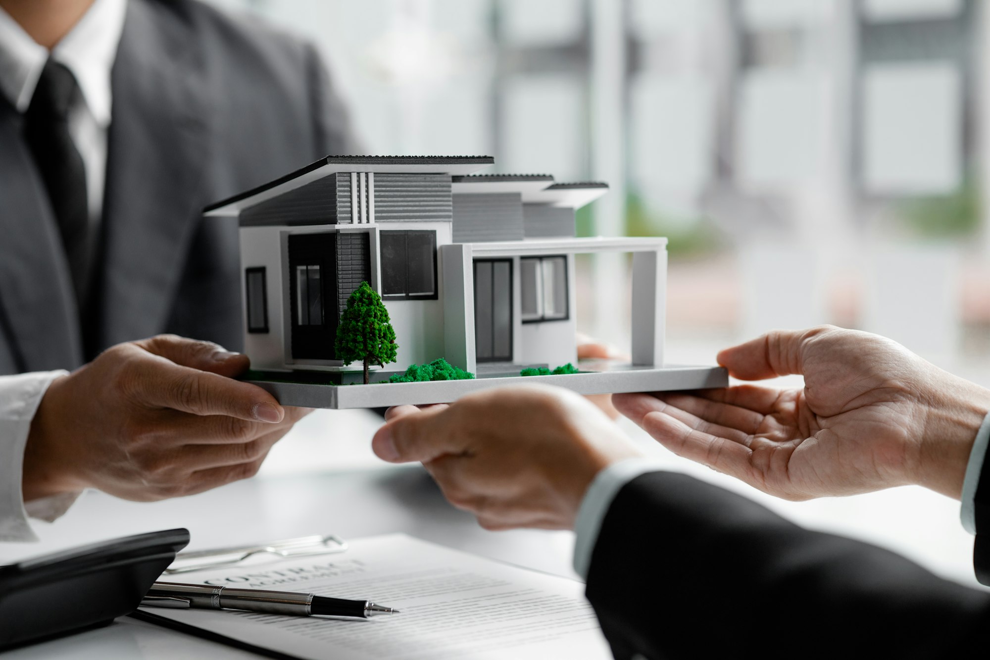 Real estate agents are carrying a housing model of the project.