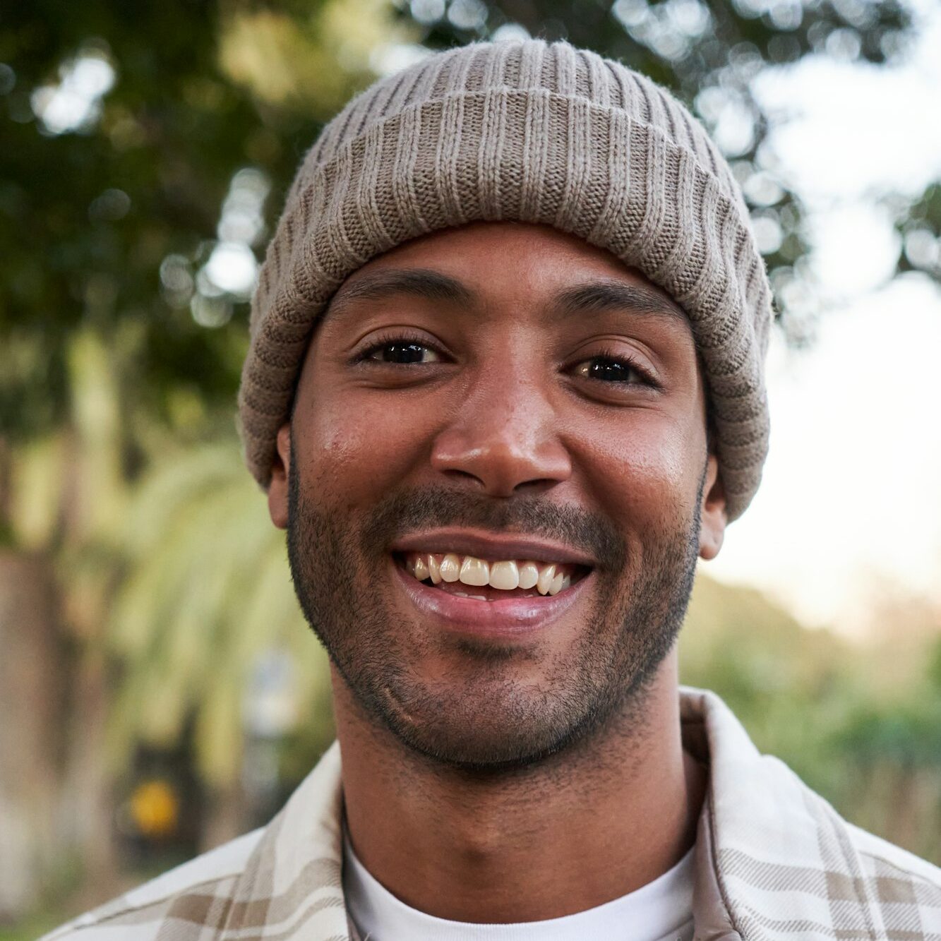 Portrait of multiracial man smiling and looking at camera.